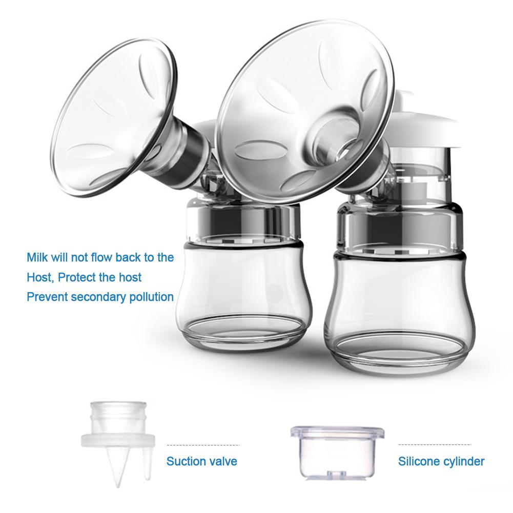 Double breast pump with clear silicone parts on a white background