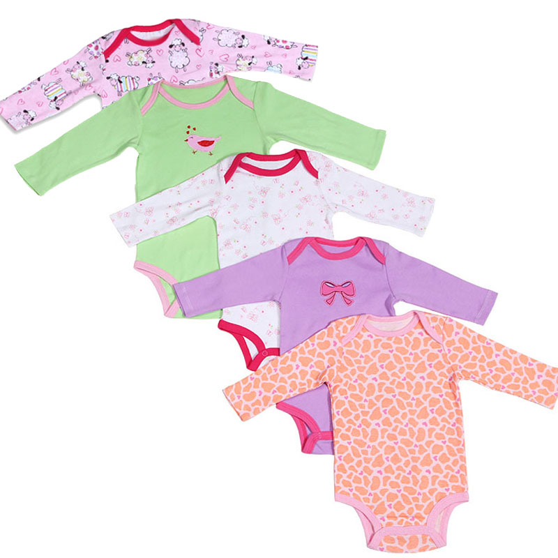 Set of five colorful baby bodysuits with various patterns on a white background
