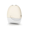 White and beige humidifier on a white background
