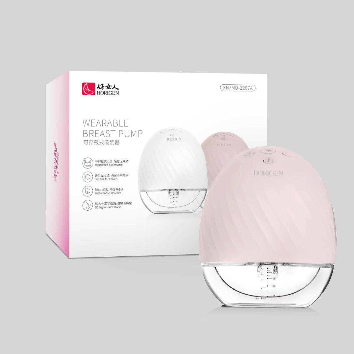 Pink wearable breast pump with packaging on a gray background
