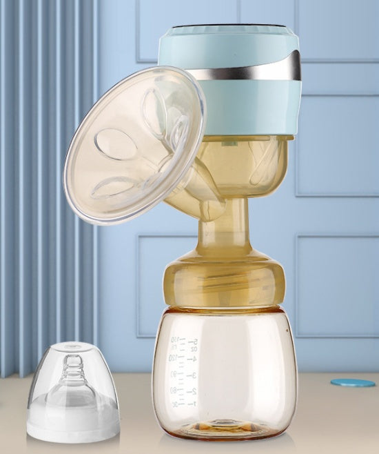 Breast pump with clear and beige components on a light blue background