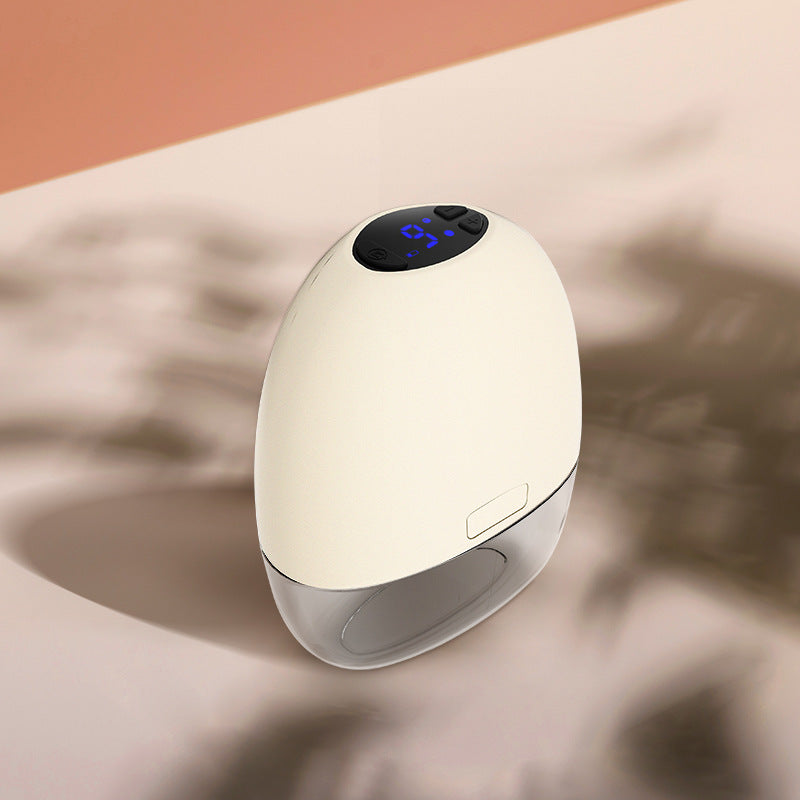 White electronic device with digital display on a beige surface